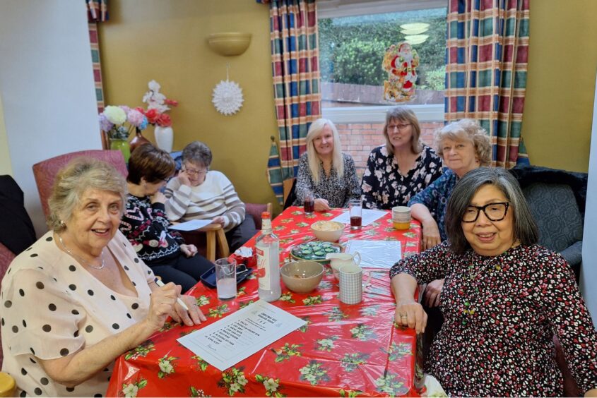 People sat round a table