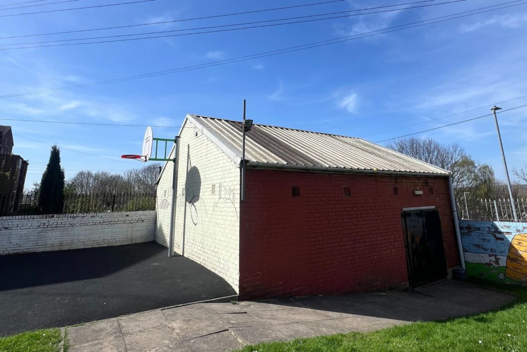 A before photo showing an old one storey shed