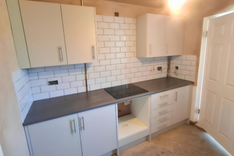 Kitchen units with electrics ready to be finished off