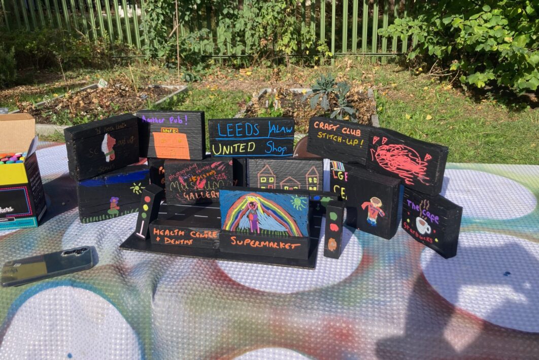 painted boxes with writing on