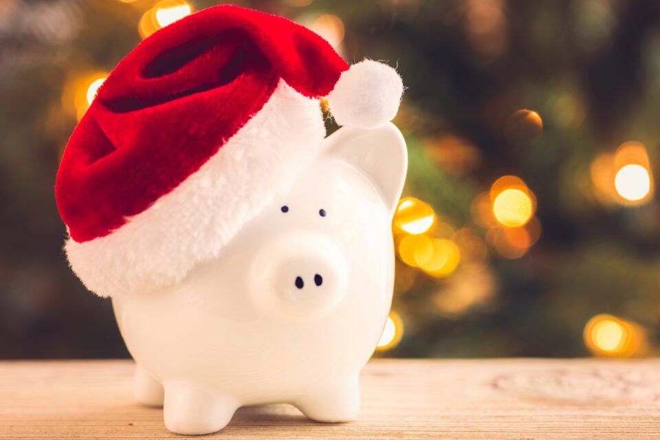 Piggy bank with santa hat on
